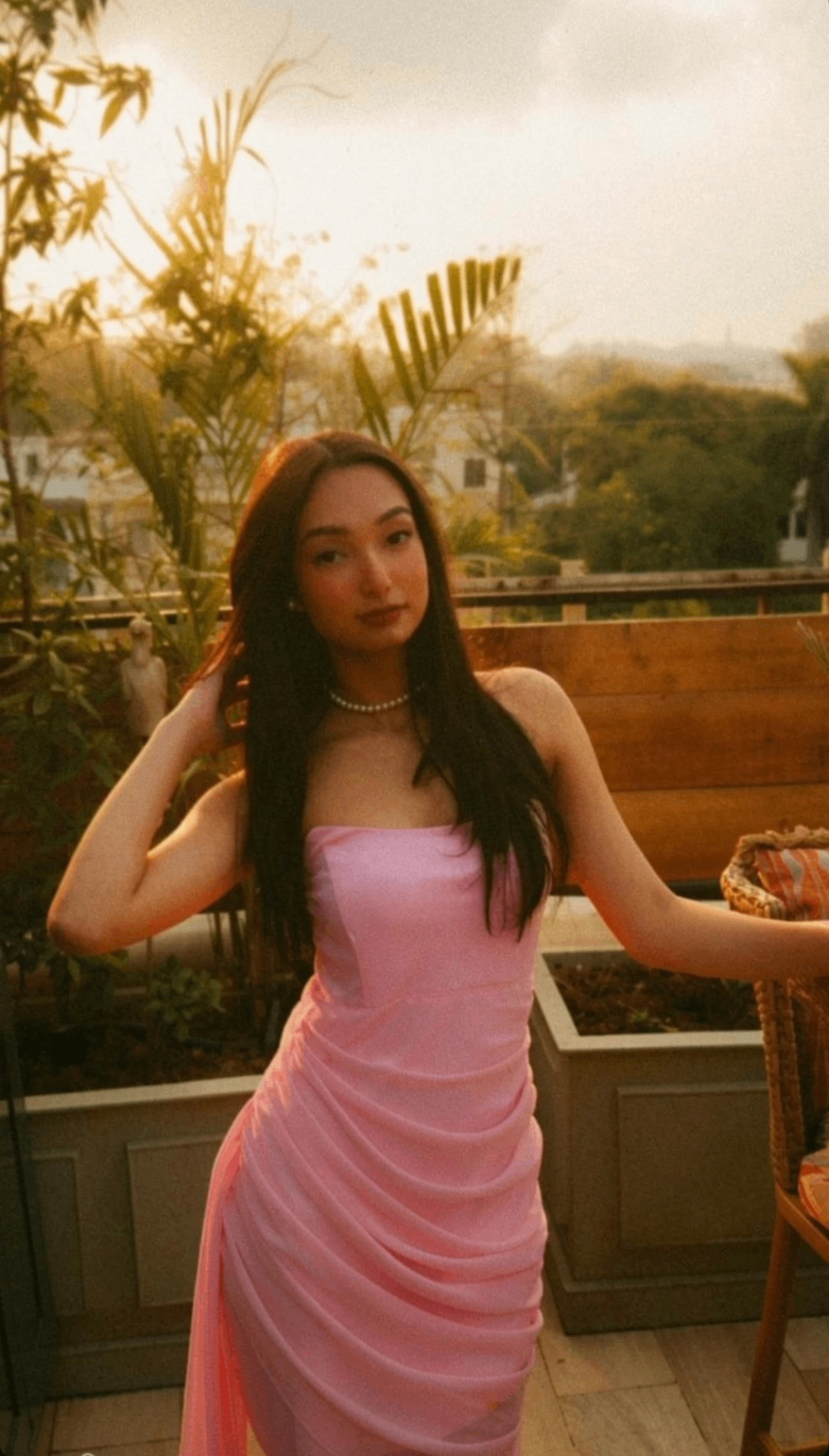 Tanya in a pink dress at golden hour
